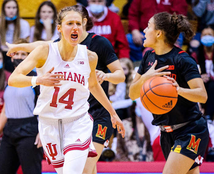 Ali Patberg runs to guard a Maryland player at Assembly Hall.